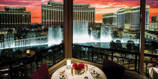 Eiffel Tower Restaurant at Paris Las Vegas, with a romantic Bellagio Fountain view before a marriage proposal