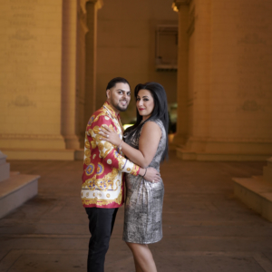 Couple posing for Surprise Photographer Proposal Tour in Las Vegas near Paris casino