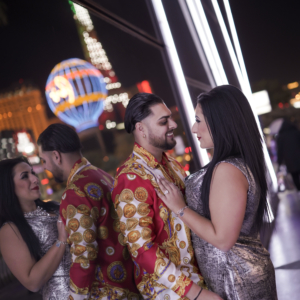 Couple posing for Surprise Photographer Proposal Tour in Las Vegas near Cosmopolitan casino