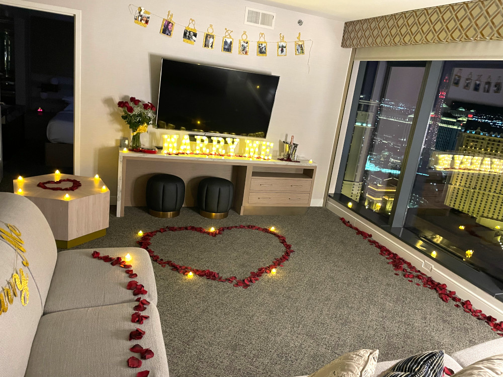 Las Vegas hotel room decorated with romantic decorations for a marriage proposal